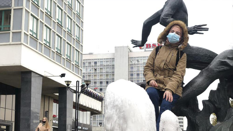 Syrian Kurd Bushra, who only gave her first name, poses for a photograph in Minsk, Belarus, Sept. 22, 2021. (Photo: AP)